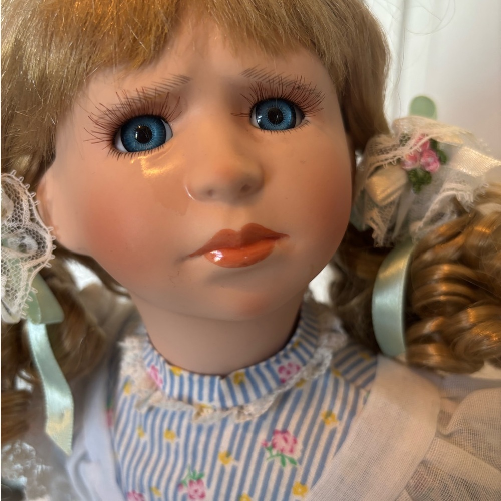 Charming Blue and White Porcelain Doll with Curly Hair - Picture 2 of 11
